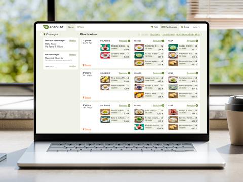un desktop che mostra non un carrello acquisti ma un calendario di pianificazione alimentare